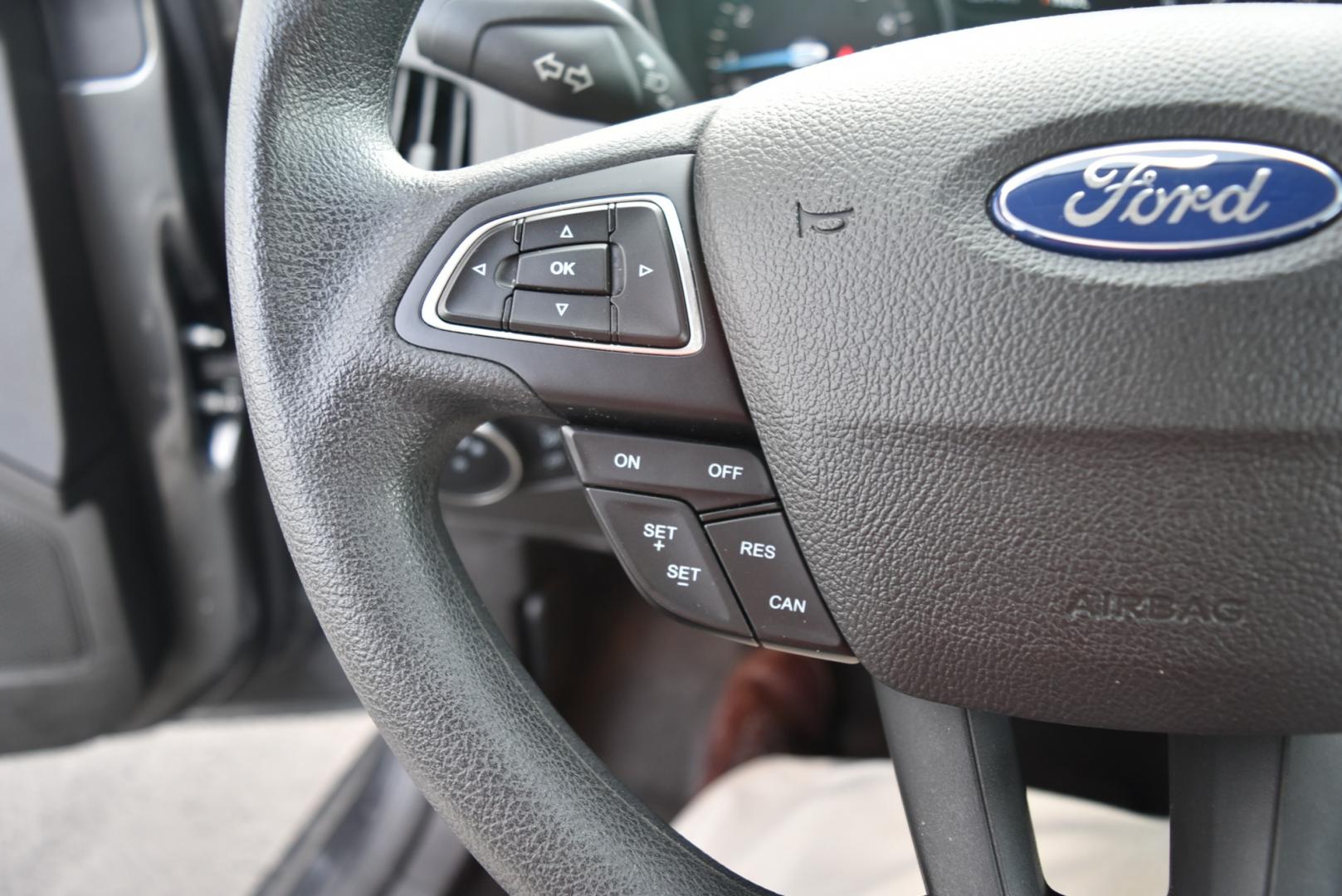 2016 Gray /Black Ford Focus SE (1FADP3F26GL) with an 2.0L I-4 GDI TI-VCT FLEX FUEL engine, 6-Speed Powershift Automatic transmission, located at 1600 E Hwy 44, Rapid City, SD, 57703, (605) 716-7878, 44.070232, -103.171410 - Photo#15